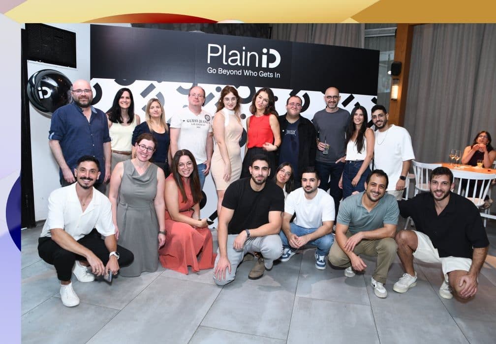 The PlainID team posing together at the office